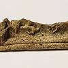 Kozly - zlomek kachle ze 13. století, nalezený v katastru zaniklé obce