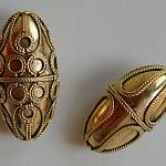 Kolín - archeologické nálezy, knížecí dvojhrob, zlacené perly (foto z archivu Národního muzea)